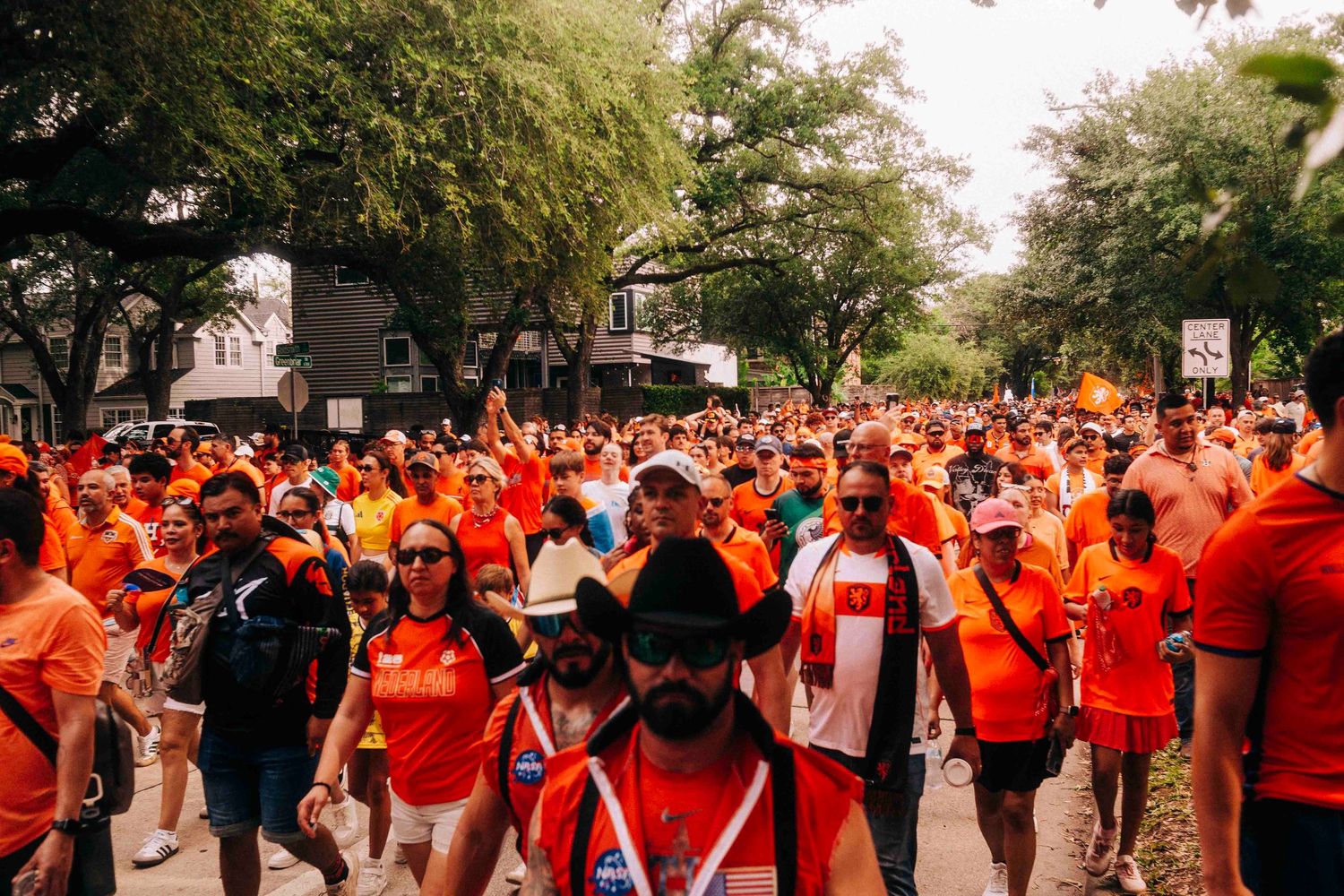 FIFA World Cup 2026 Houston | A sea of Netherland football fans at the Orange Bus fan walk | Photos by Robert Paul
