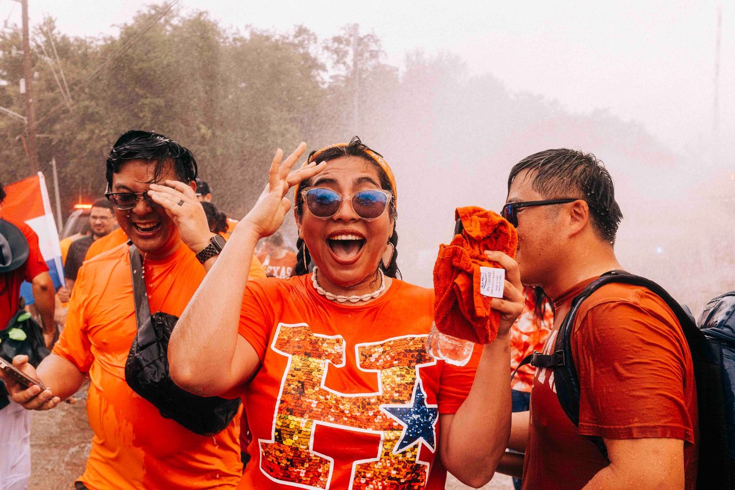 FIFA World Cup 2026 Houston | Fan cools off in the firehose from HFD | Photos by Robert Paul