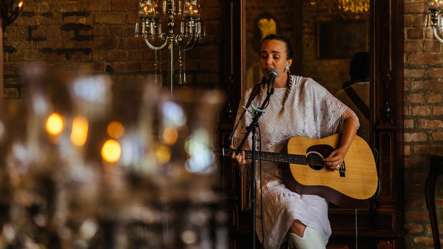Street photography by Robert Paul | signer songwriter at the White Linen Festival in League City, Texas, 2025