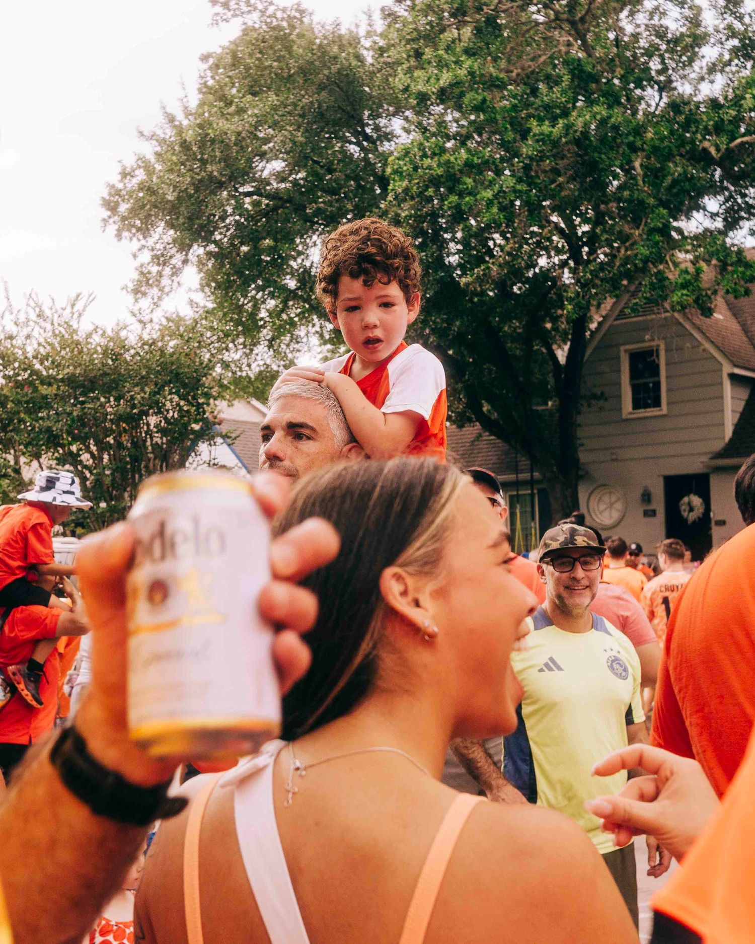 FIFA World Cup 2026 Houston | Netherland football fan enjoys a new visual during the Orange Bus fan walk | Photos by Robert Paul