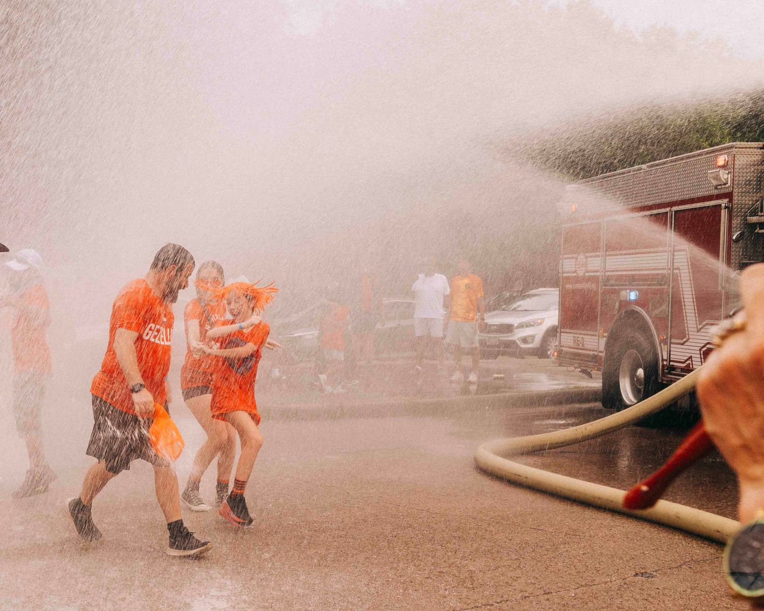 FIFA World Cup 2026 Houston | Family enjoys the firehose to cool off in the Houston heat | Photos by Robert Paul