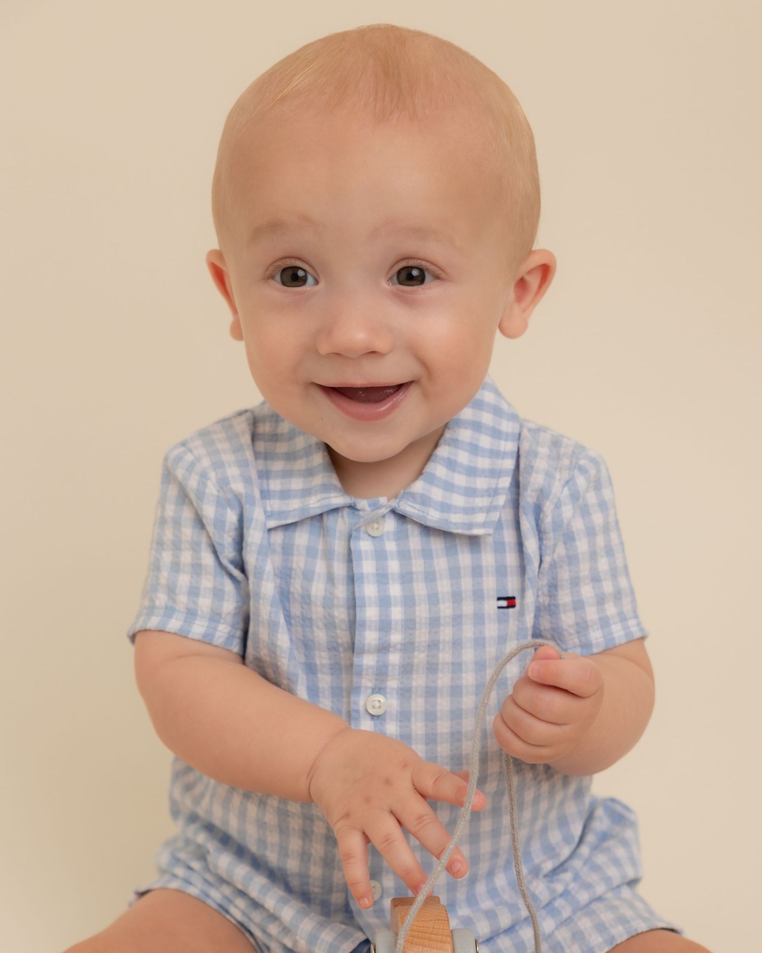 Smiling 10 month old sitter
