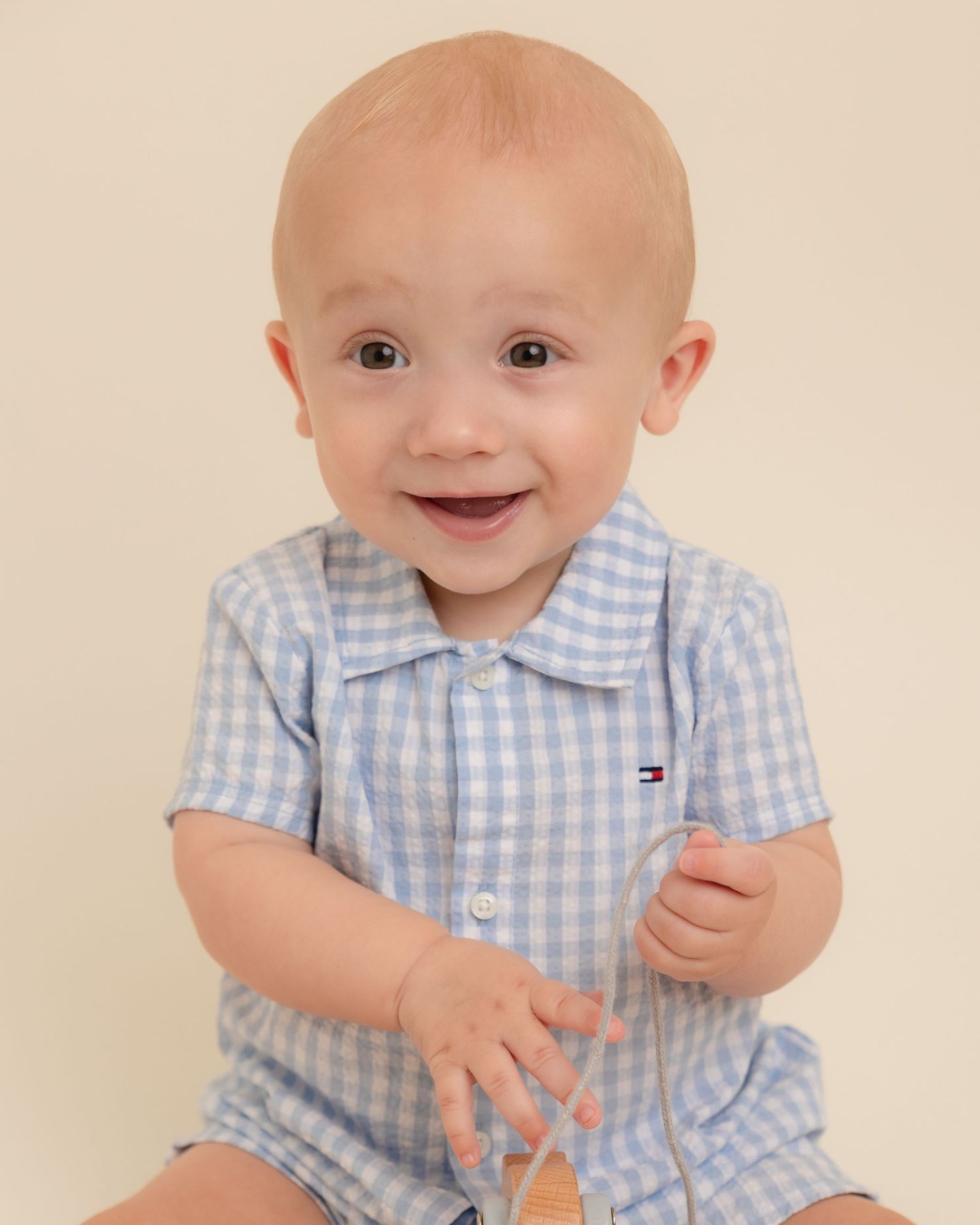 Older baby sitting up unaided