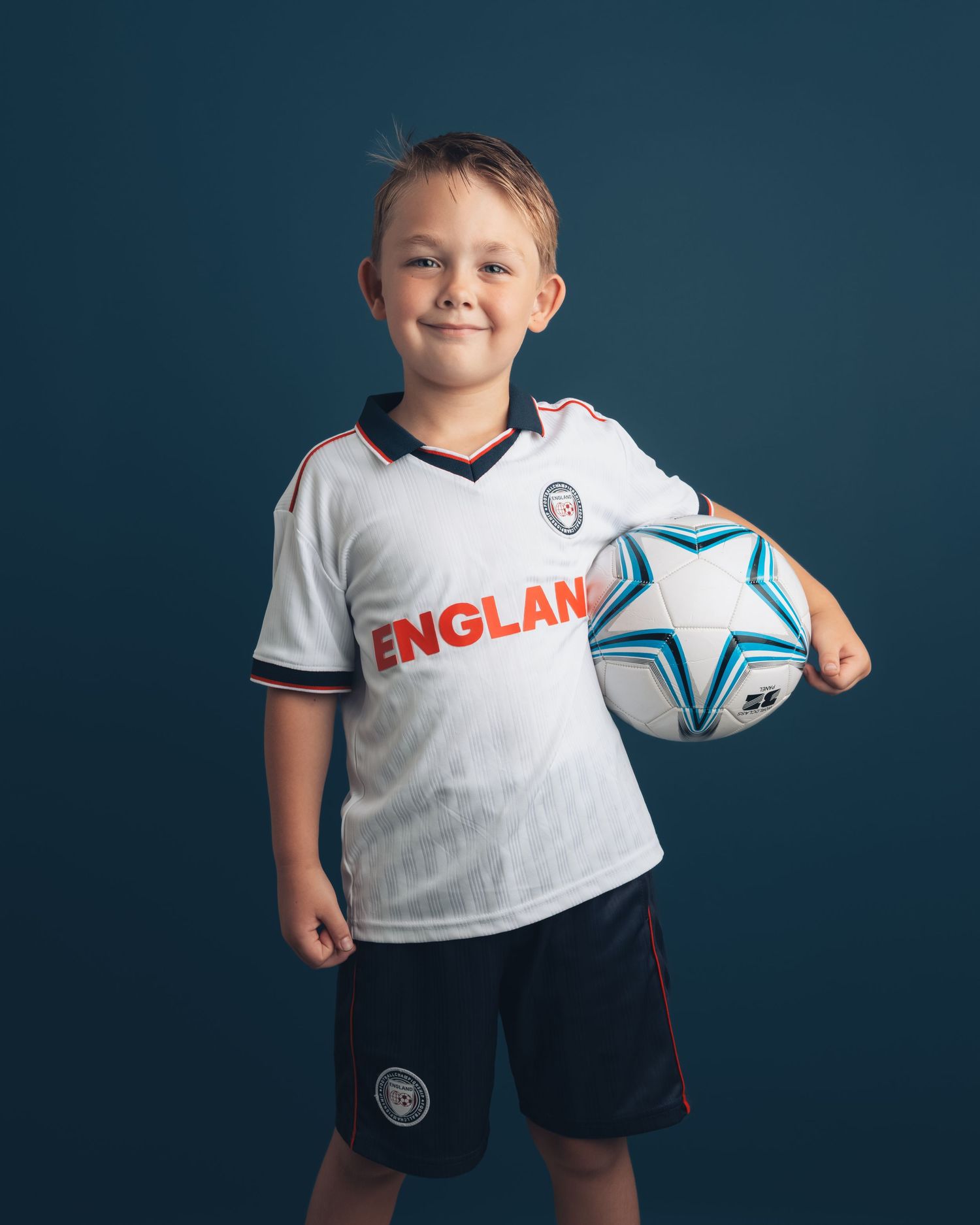 Boy in football kit