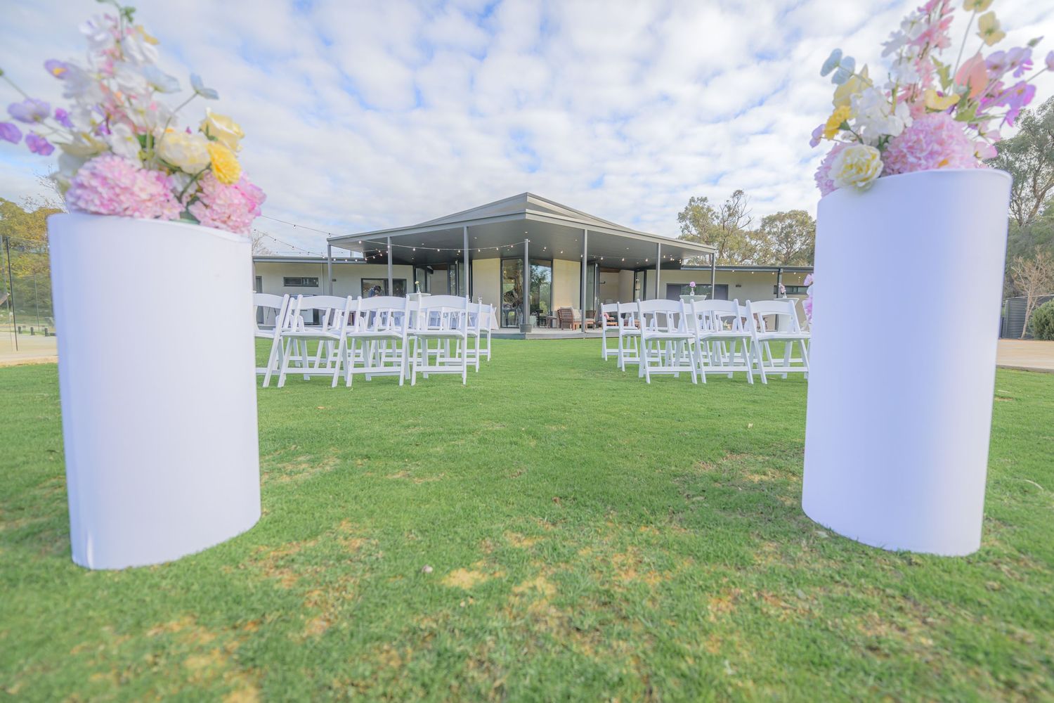 Wedding venue photographed with natural light, showcasing ceremony space and architectural details.