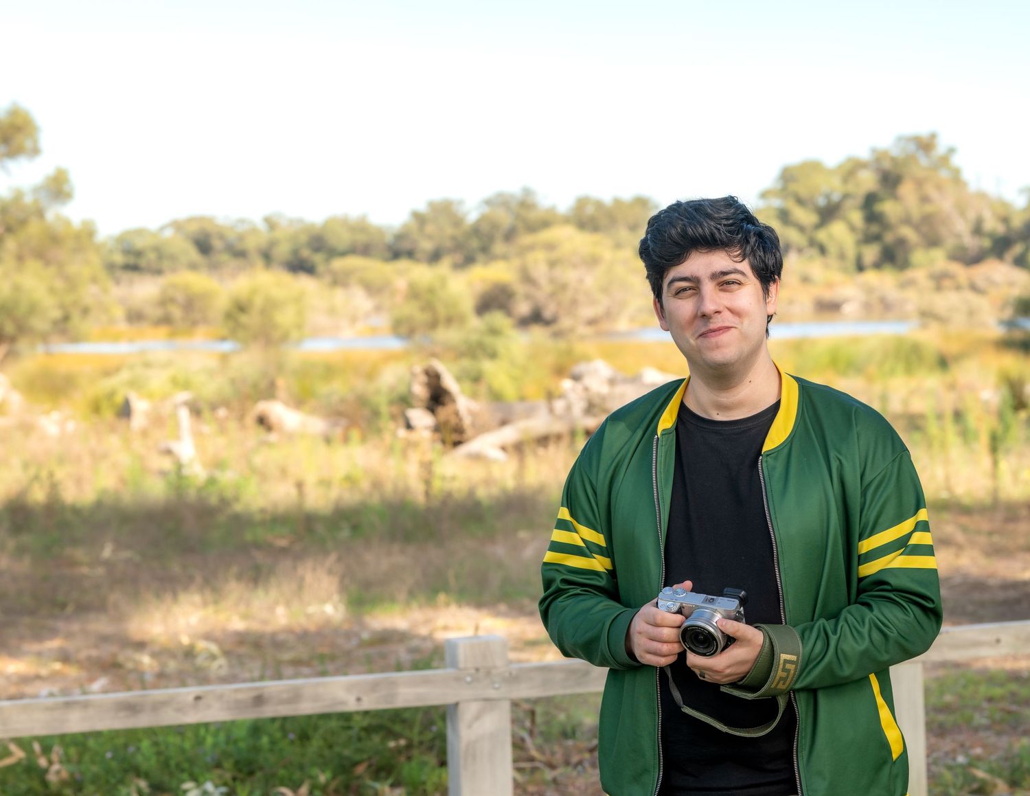 Individual male portrait with clean background and professional posing.