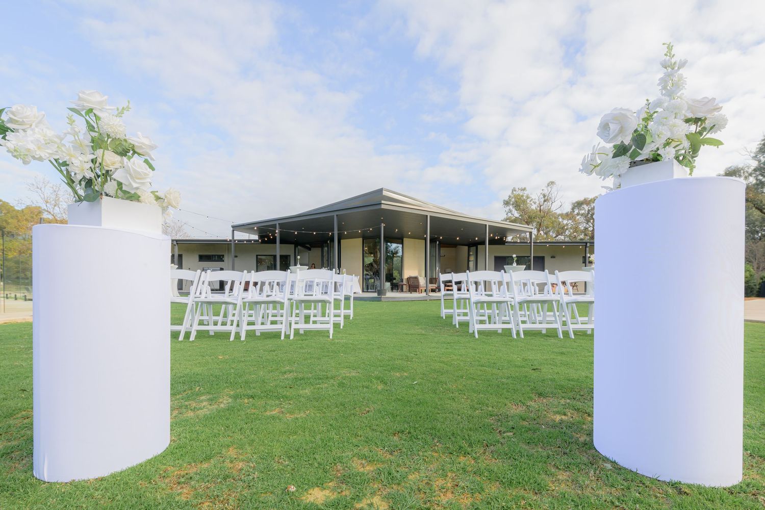 Wedding venue photographed with natural light, showcasing ceremony space and architectural details.