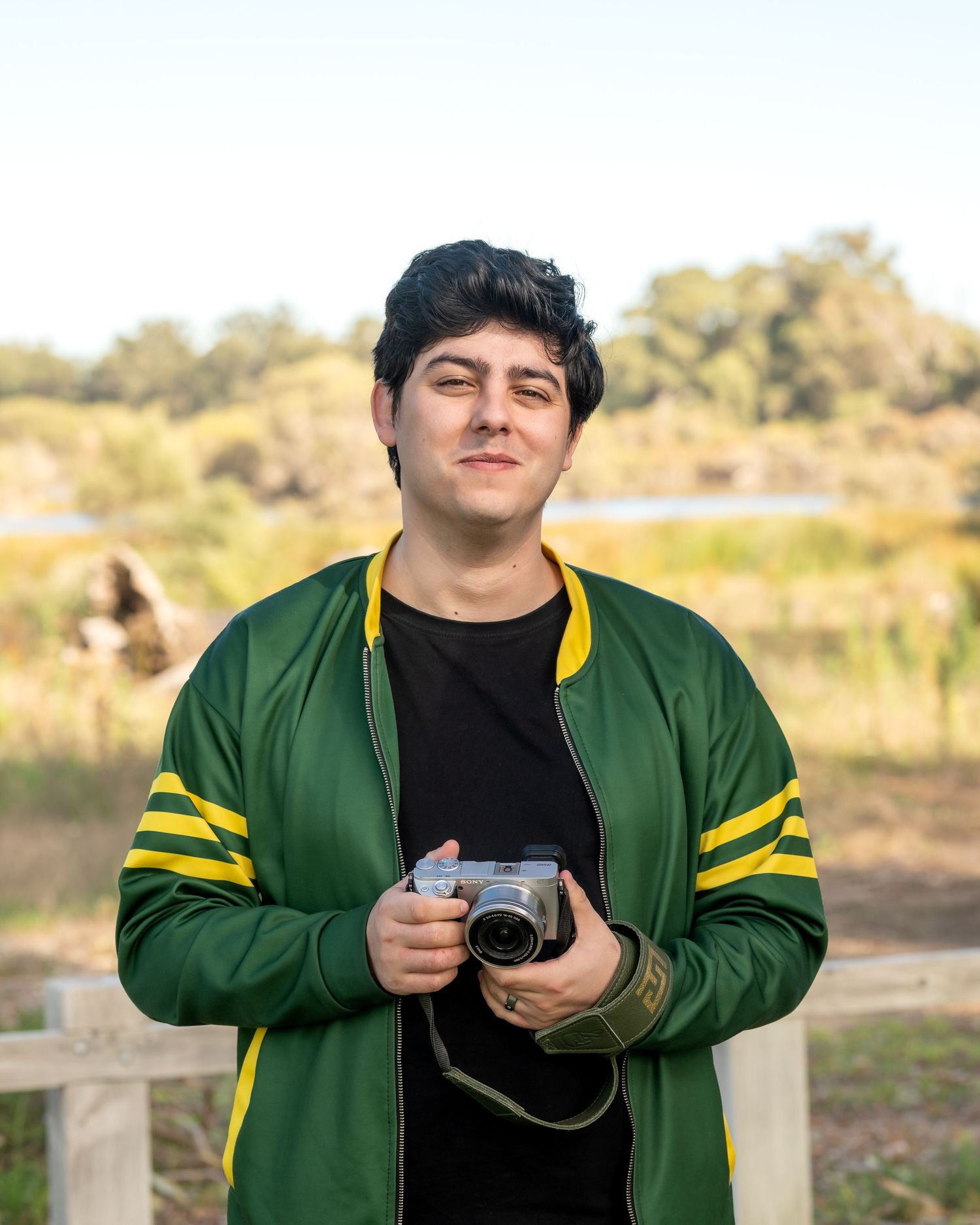 Individual male portrait with clean background and professional posing.