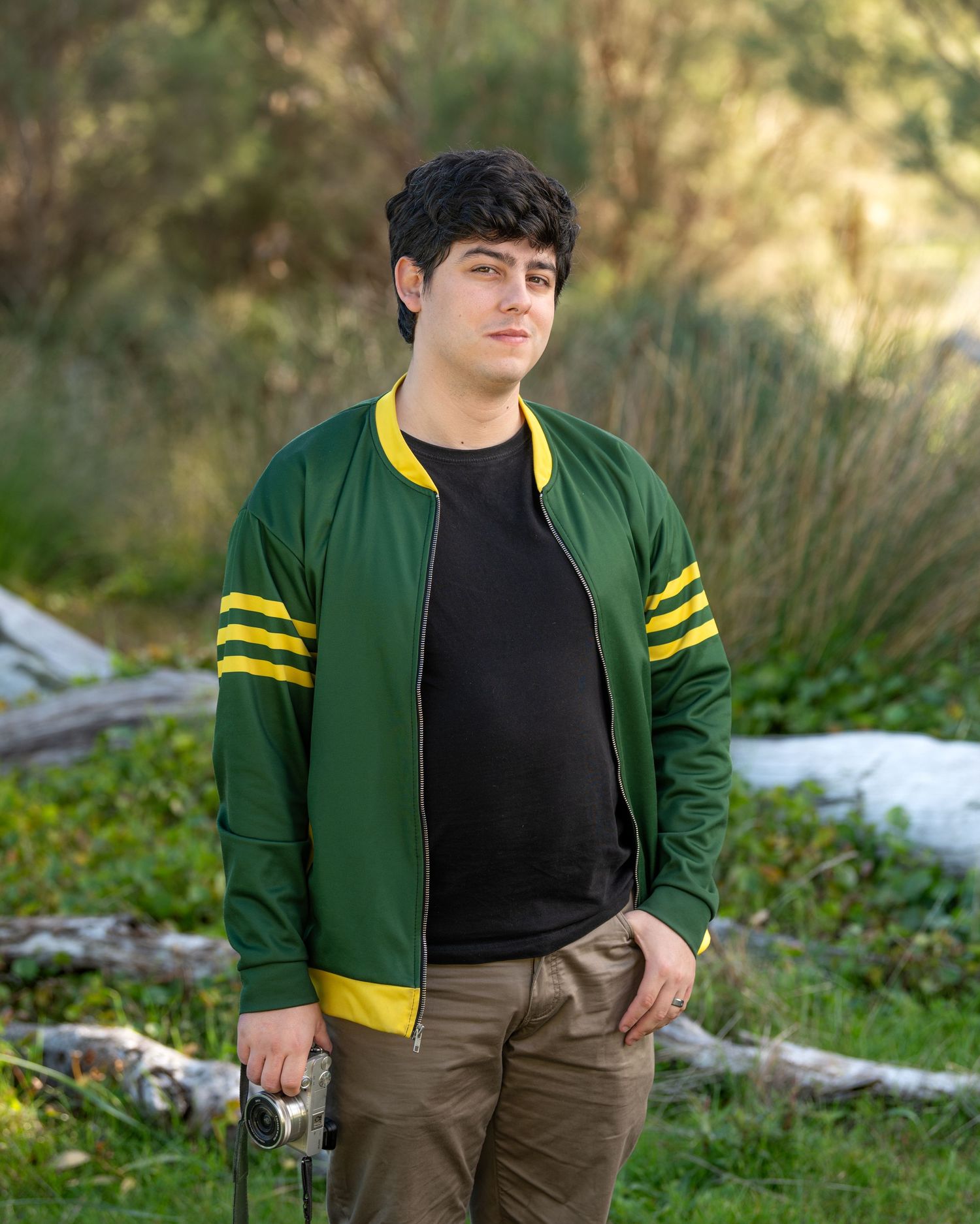 Individual male portrait with clean background and professional posing.