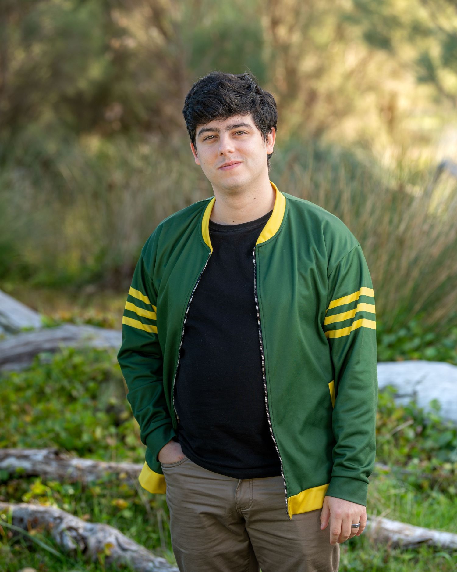 Individual male portrait with clean background and professional posing.
