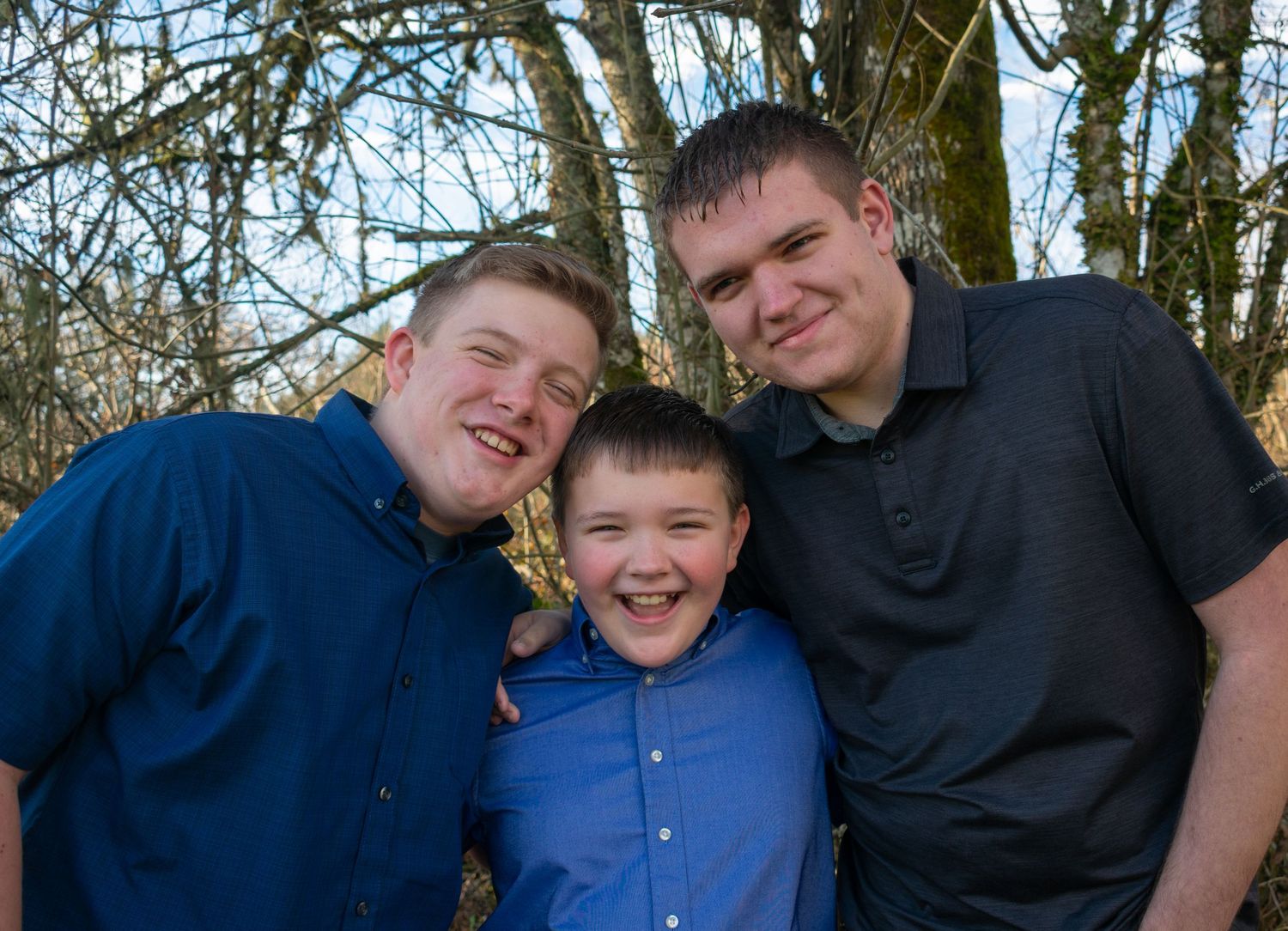 Brothers casually posing together during family session in Newport Oregon.