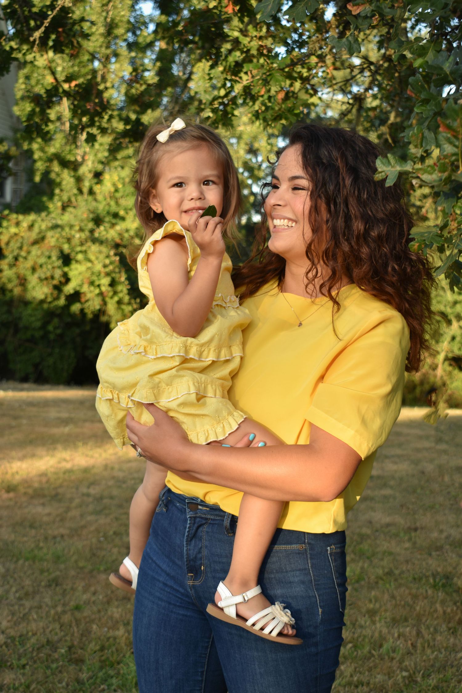 Mom and daughter posing together during family photo session in Corvallis Oregon.