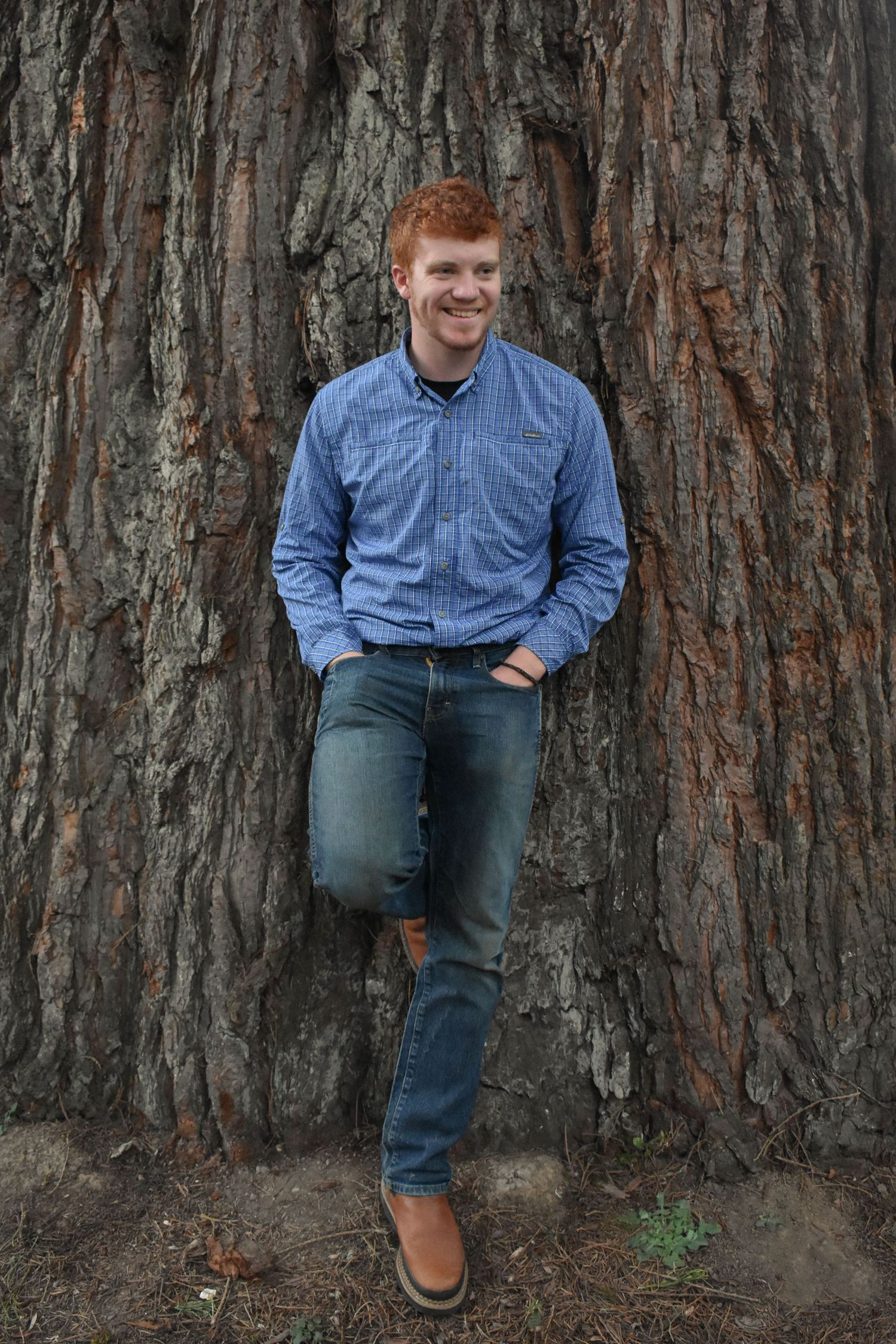 Close-up of a male posing for his senior photos in Oregon.