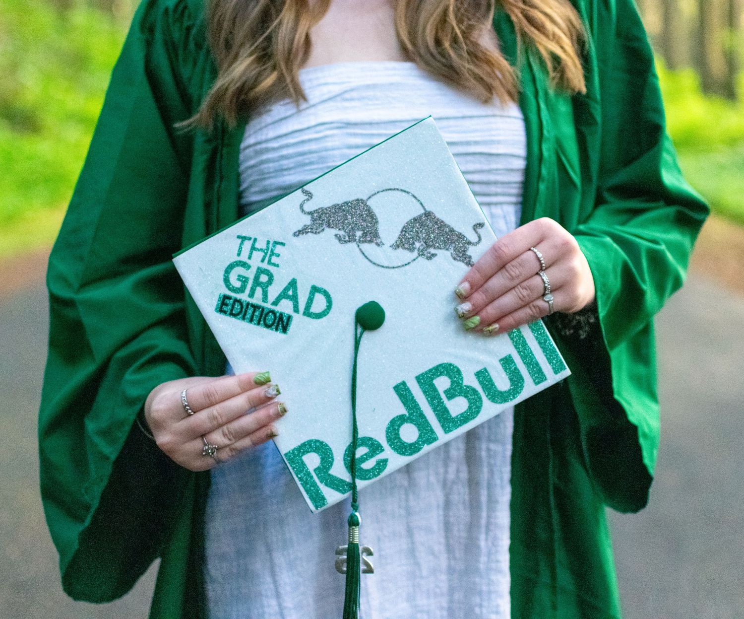 Close up of graduation cap during cap and gown session in Newport Oregon.