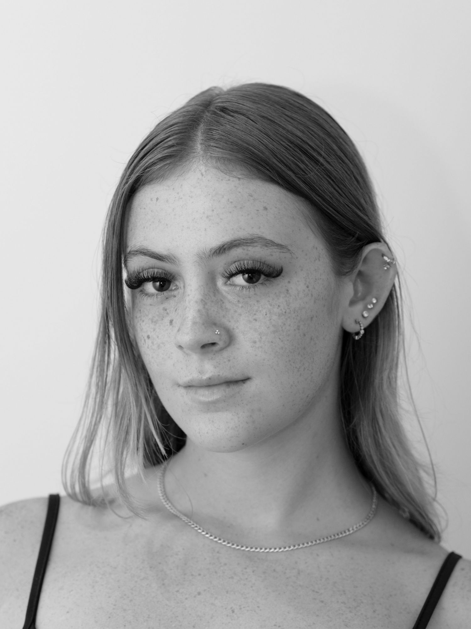 A monochrome portrait of a young woman.
