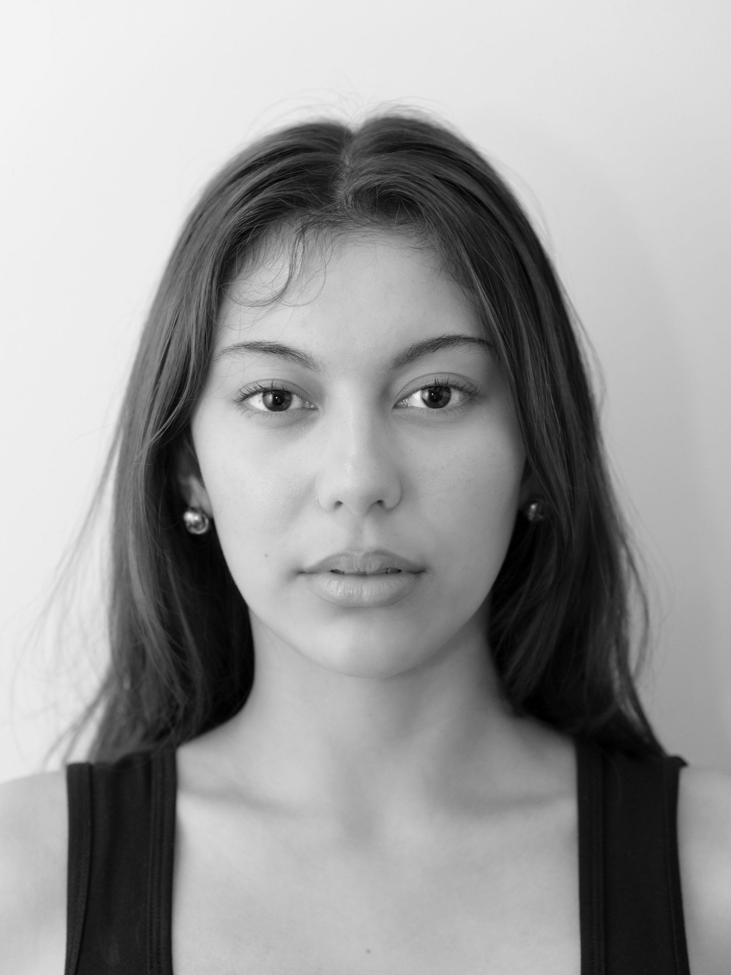 A monochrome portrait of a young woman.