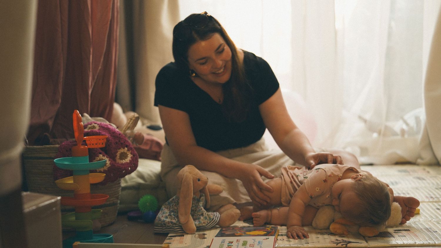 Natural light, at home photography session with mother and baby, in Suffolk.