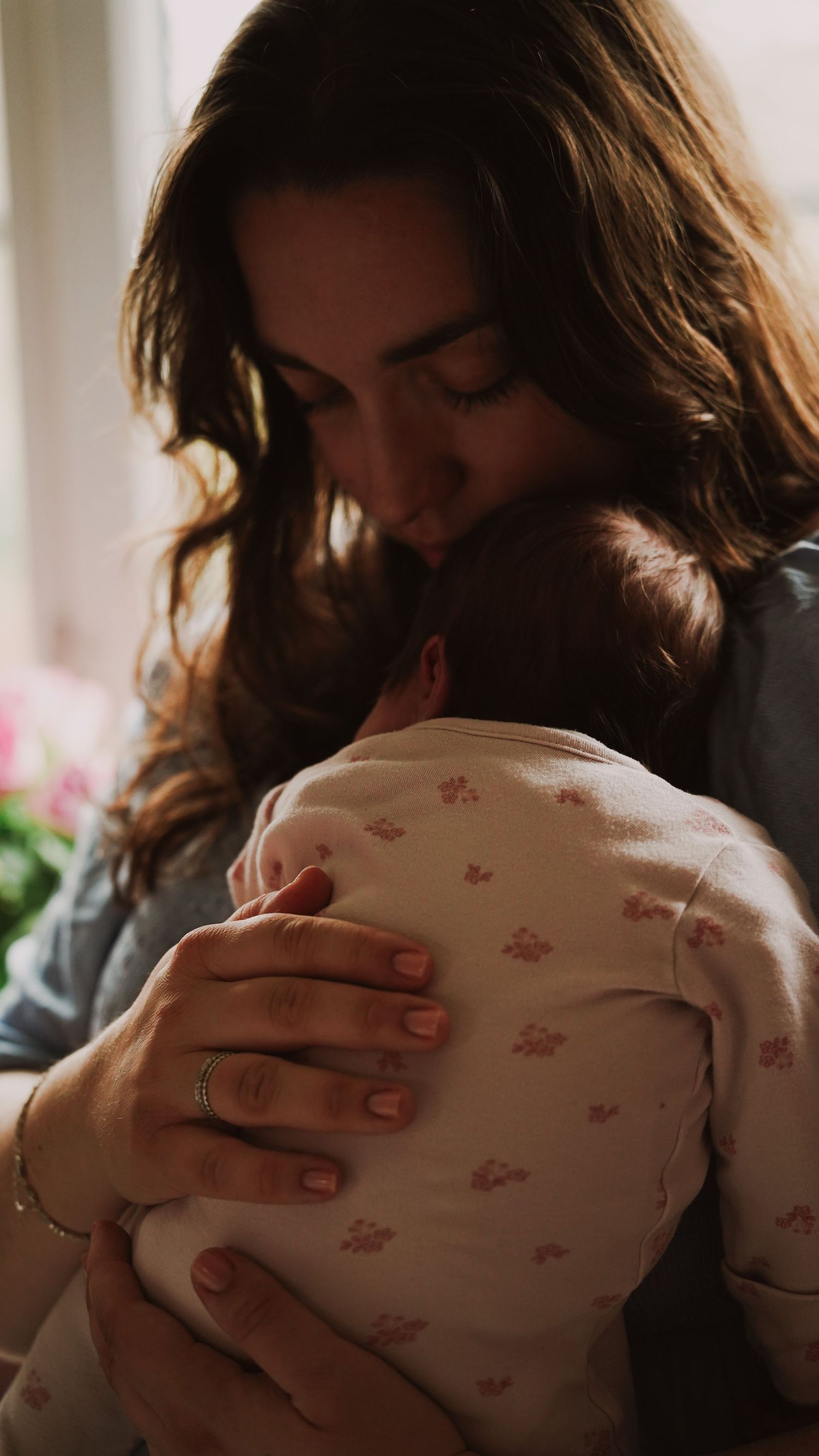 Newborn baby, at home, natural light photograph. Suffolk.