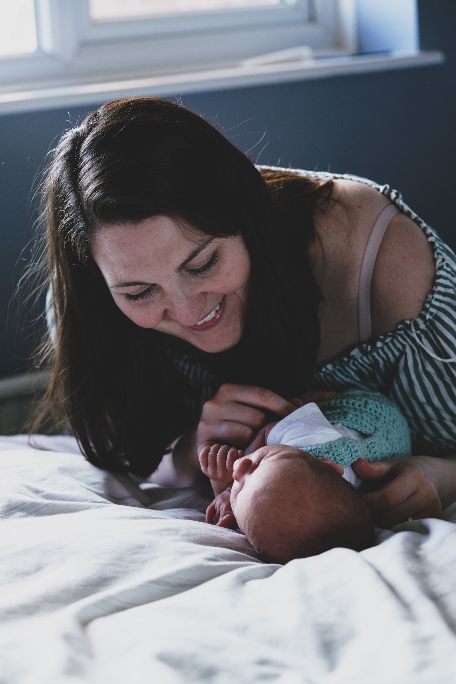 Newborn baby, at home, natural light photograph.