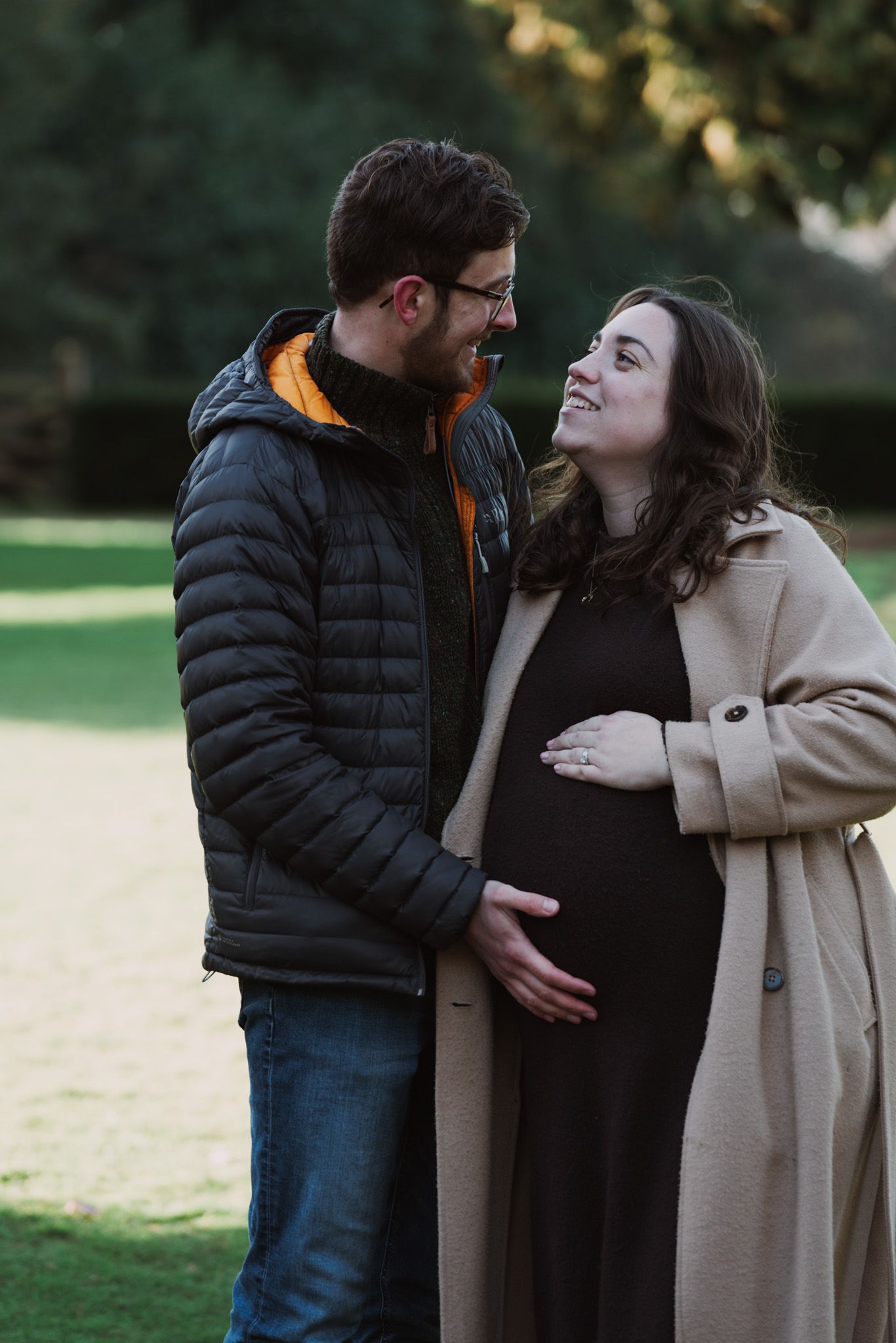 Natural light, outdoor family and maternity photos in Suffolk. Pregnant mother and partner.