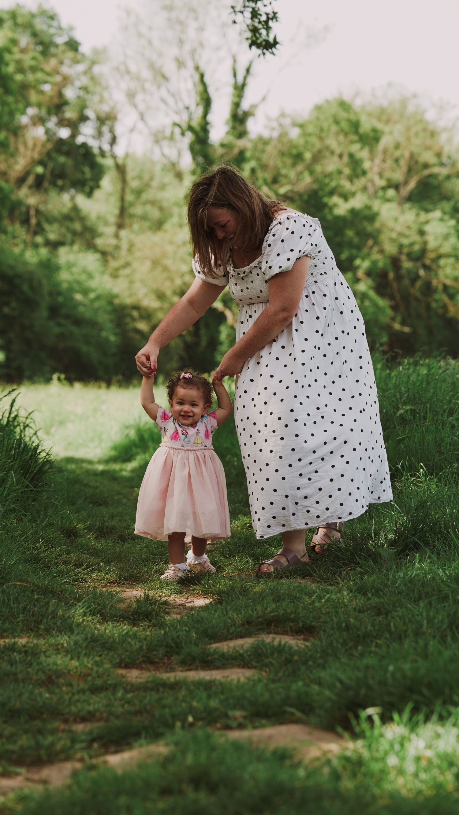Mother and baby, natural light photograph. Suffolk.