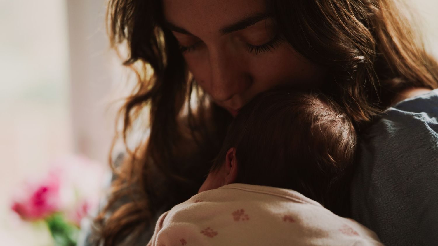 Newborn baby, at home, natural light photograph. Suffolk.