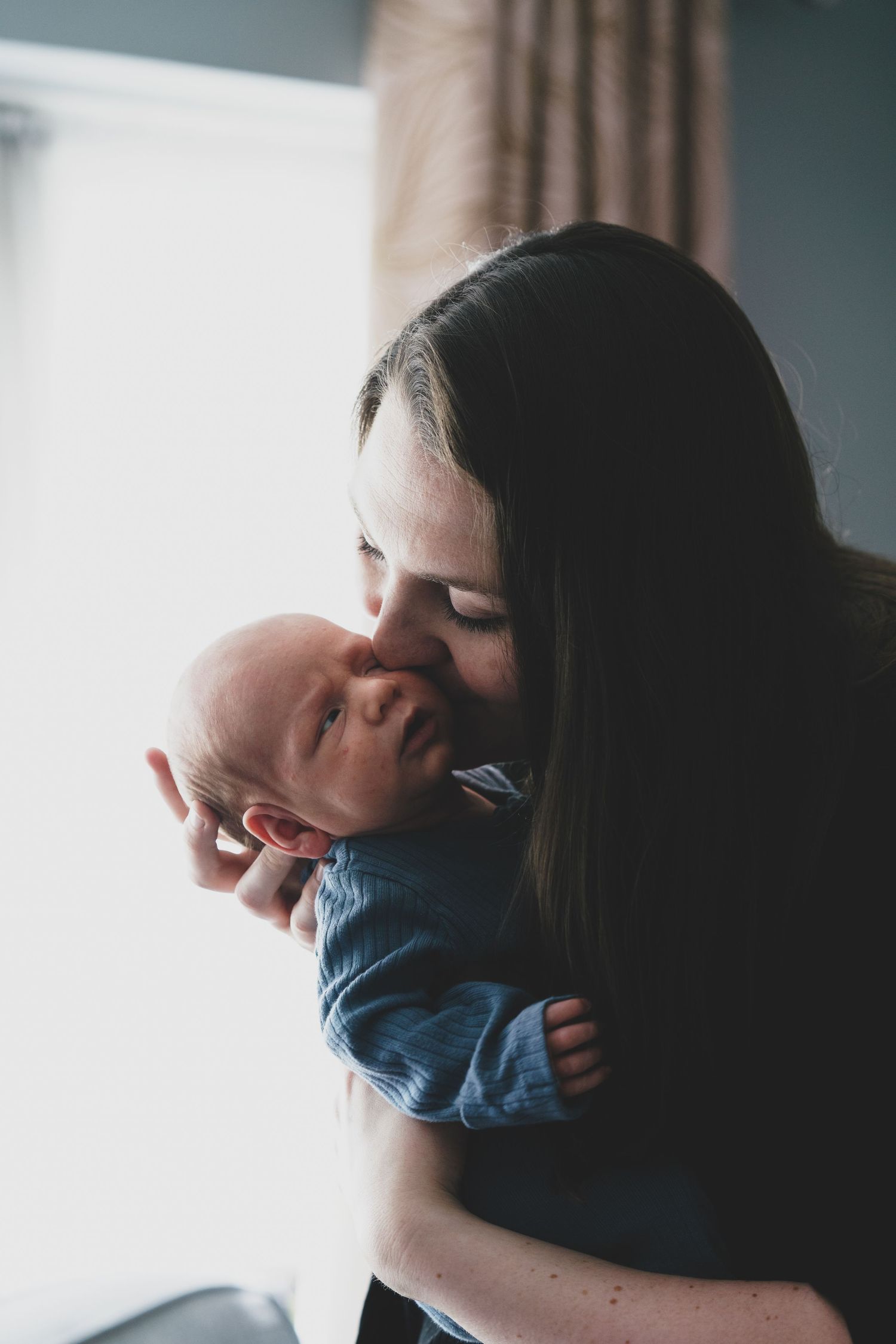 Newborn baby, at home, natural light photograph.