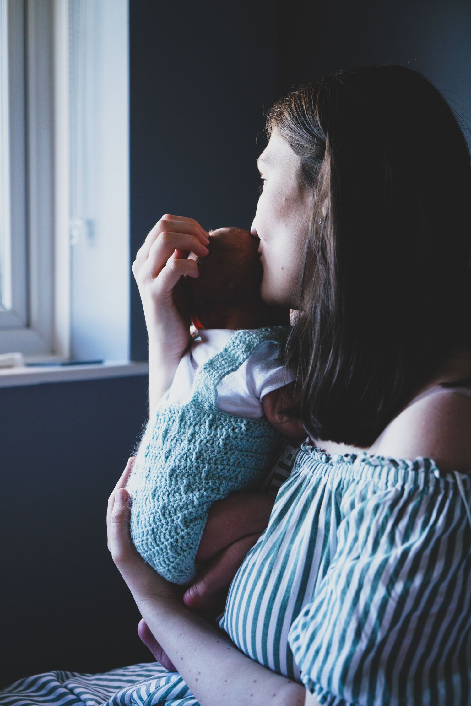 Newborn baby, at home, natural light photograph.