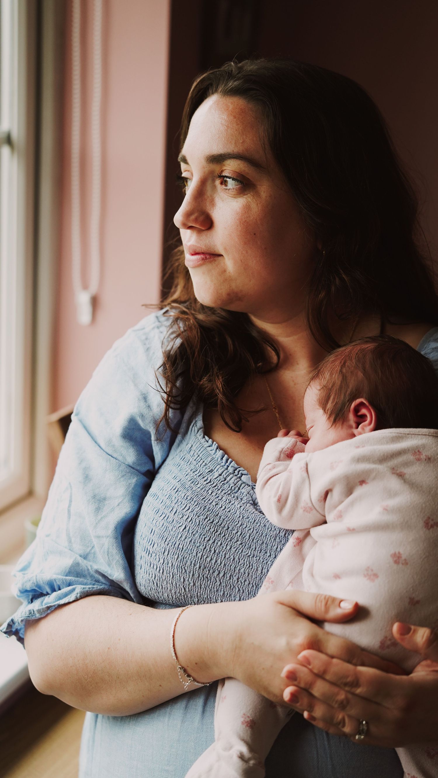Newborn baby, at home, natural light photograph. Suffolk.