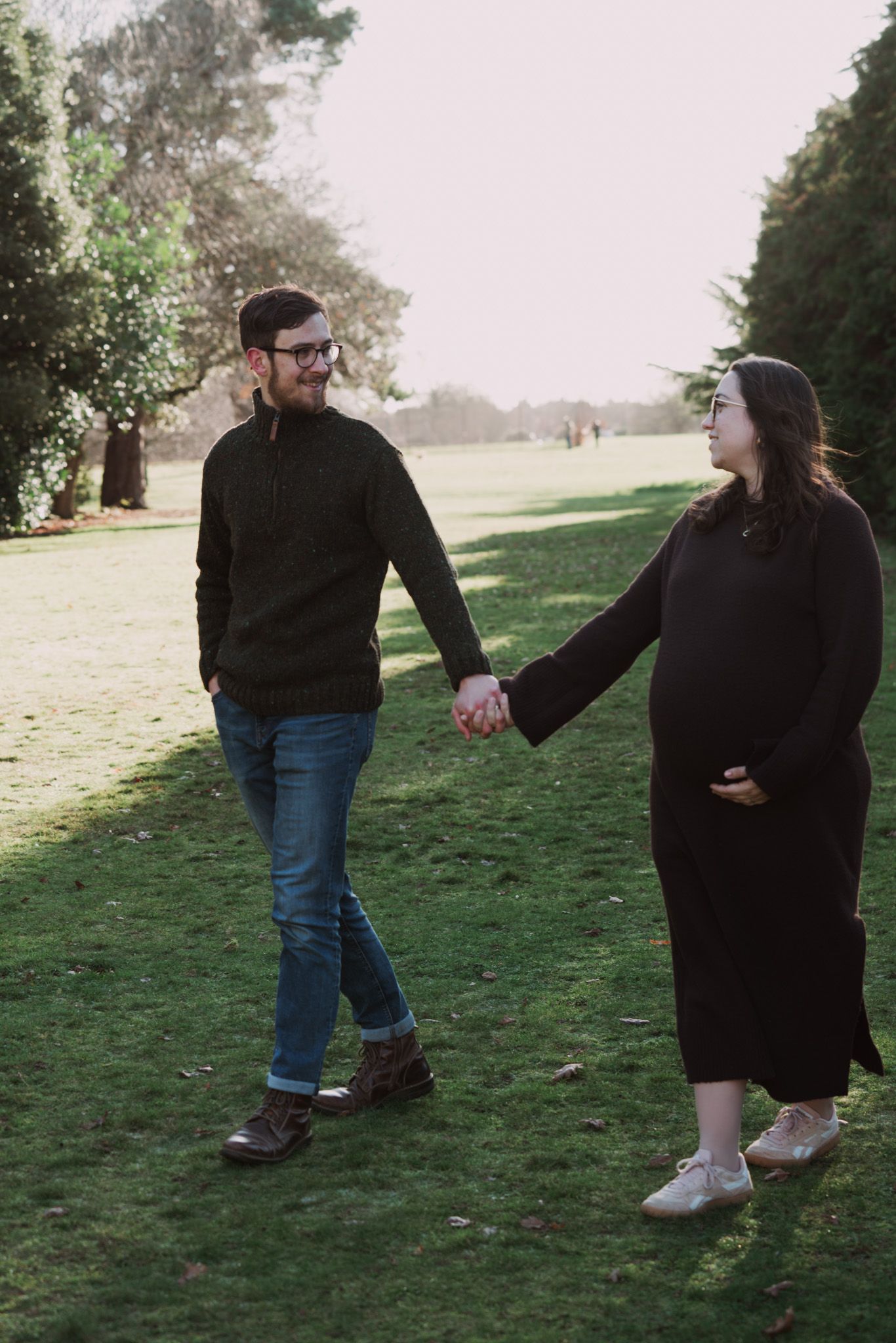 Natural light, outdoor family and maternity photos in Suffolk. Pregnant mother and partner.