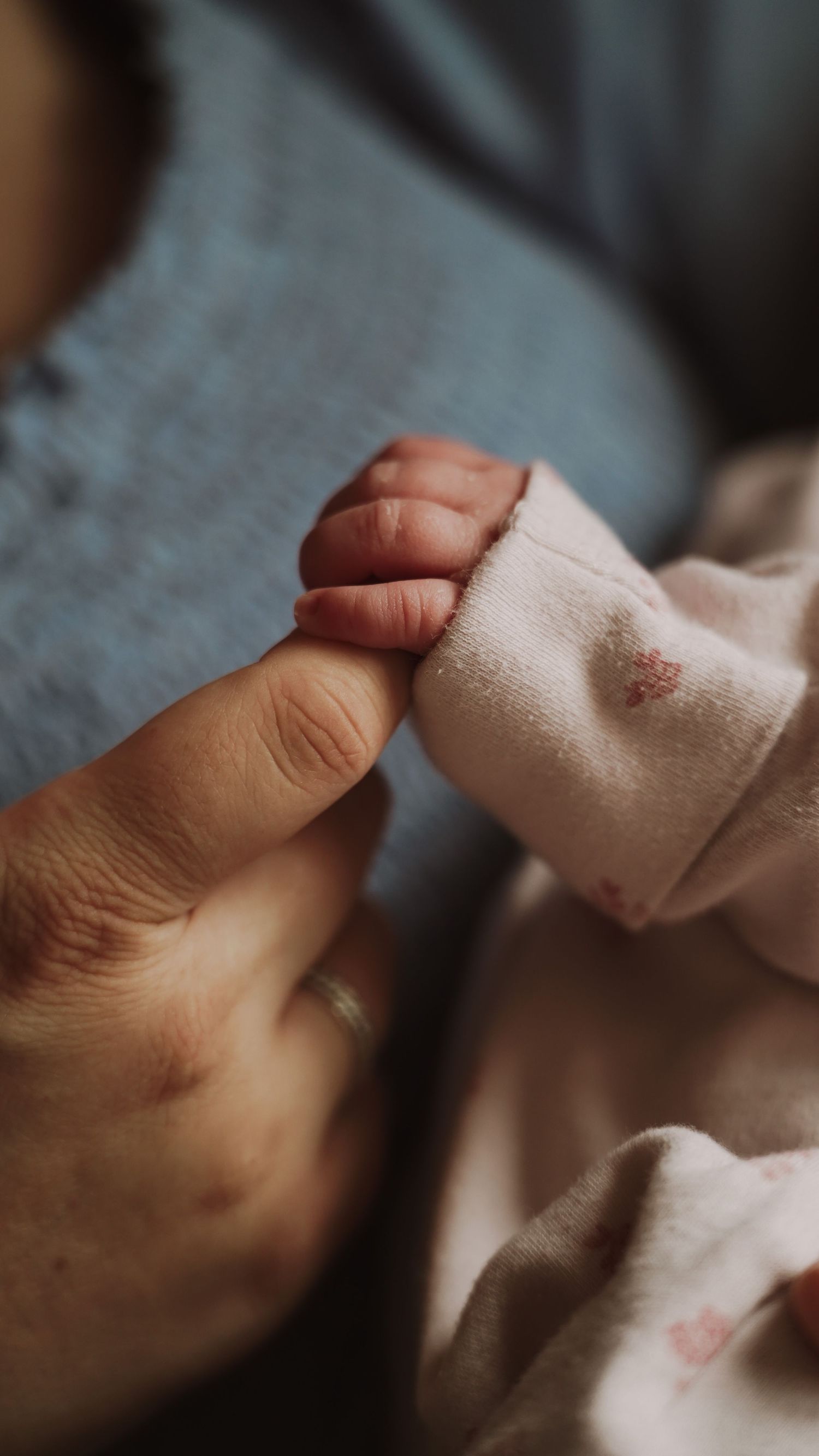 Newborn baby, at home, natural light photograph. Suffolk.