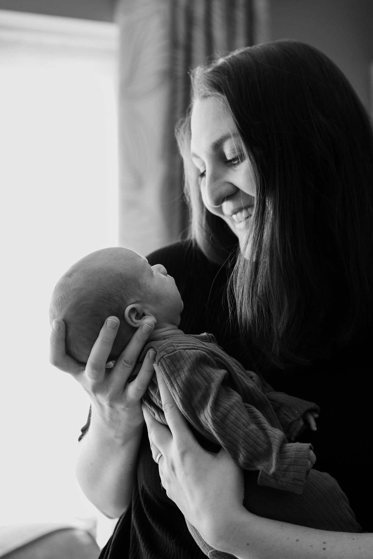 Newborn baby, at home, natural light photograph.