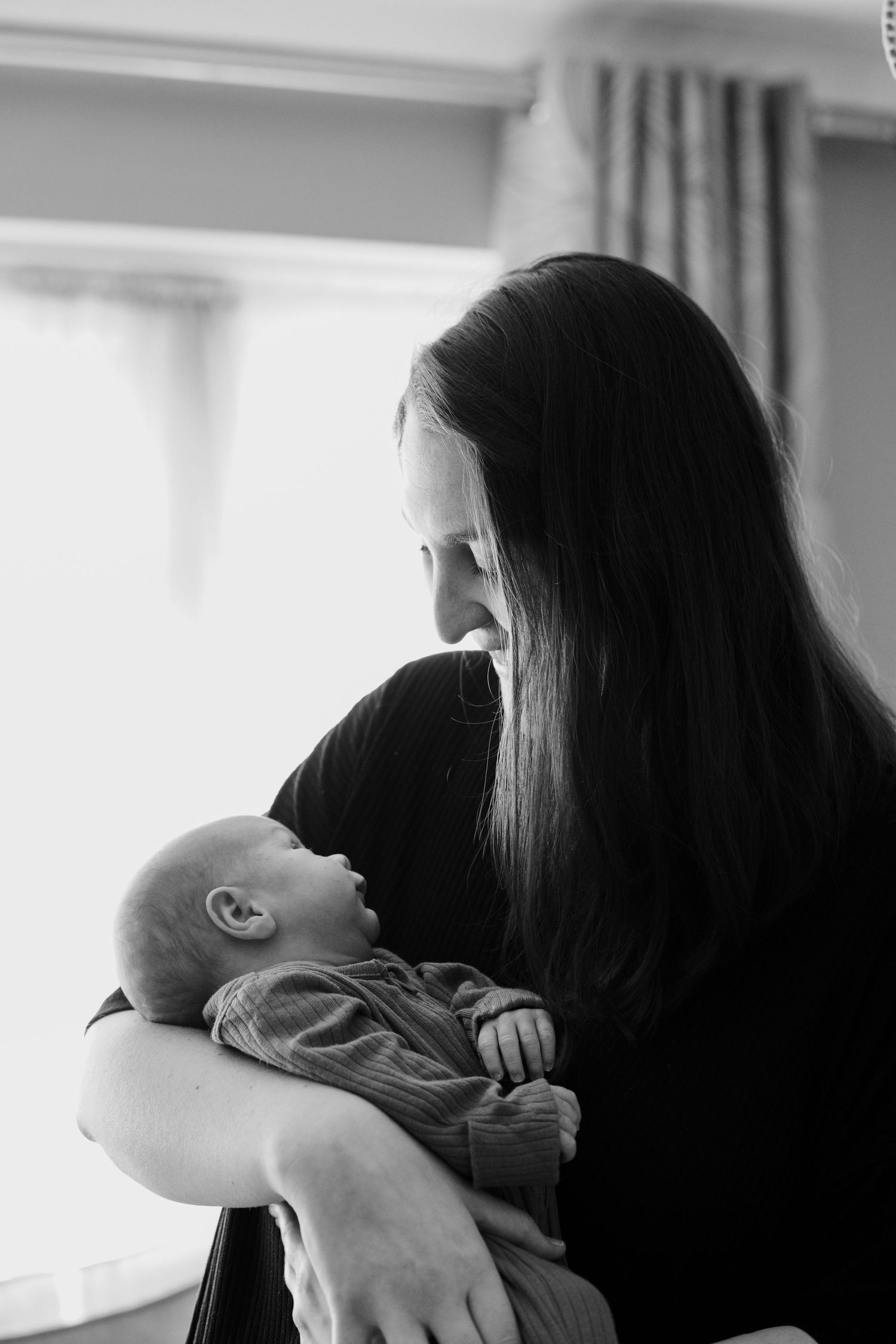 Newborn baby, at home, natural light photograph.