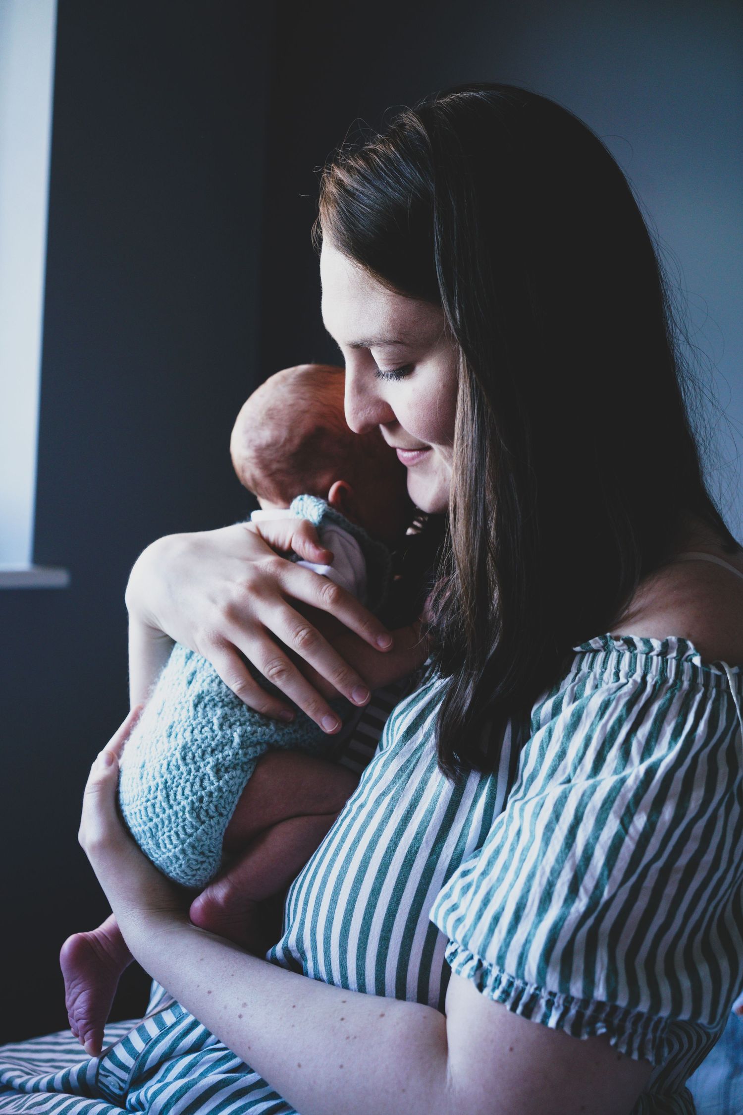 Newborn baby, at home, natural light photograph.