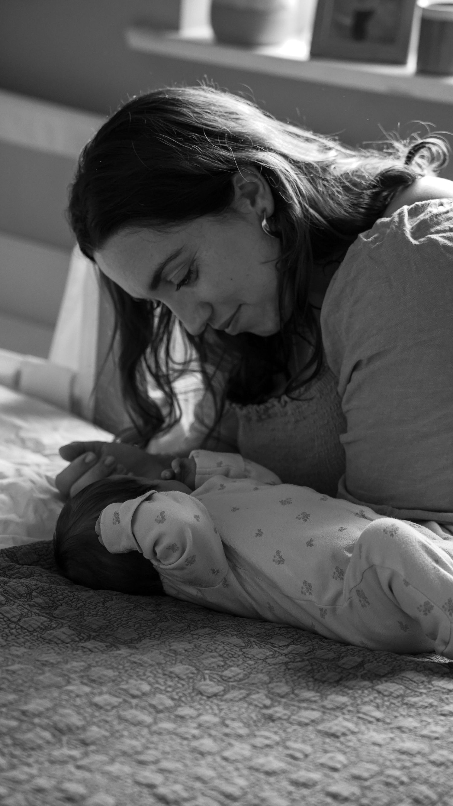 Newborn baby, at home, natural light photograph. Suffolk.