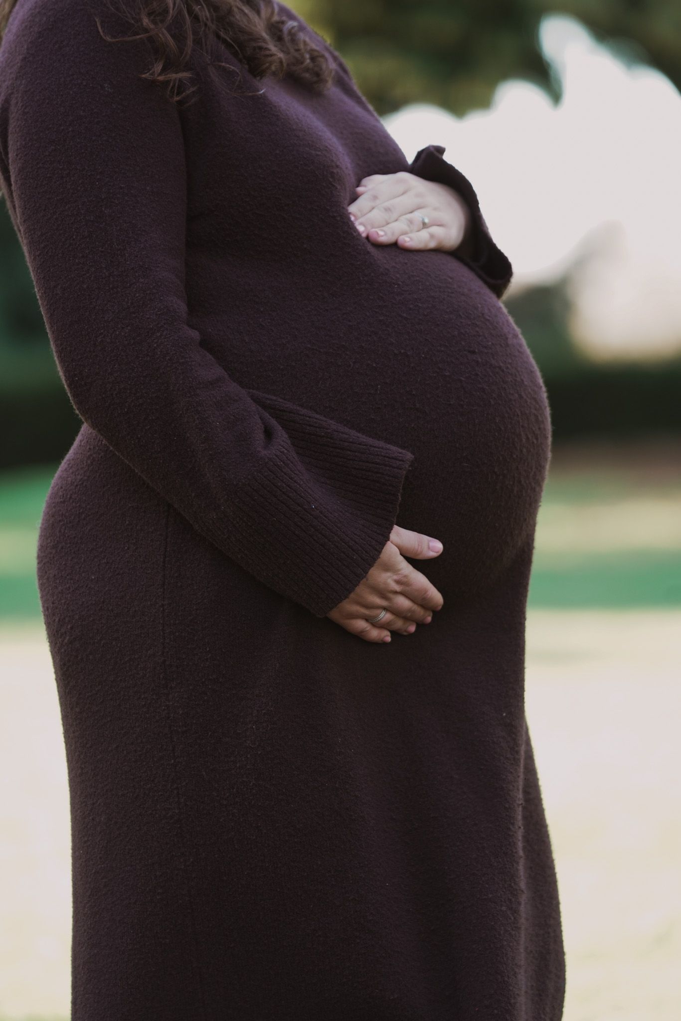 Natural light, outdoor maternity photos in Suffolk. Pregnant mother's bump.