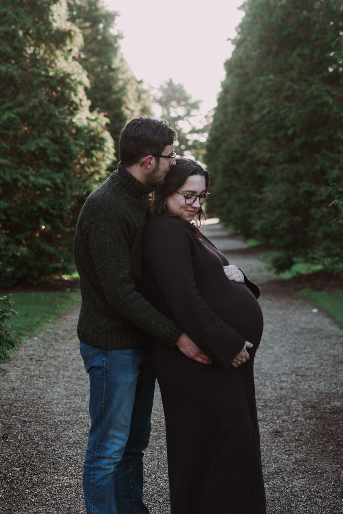 Natural light, outdoor family and maternity photos in Suffolk. Pregnant mother and partner.