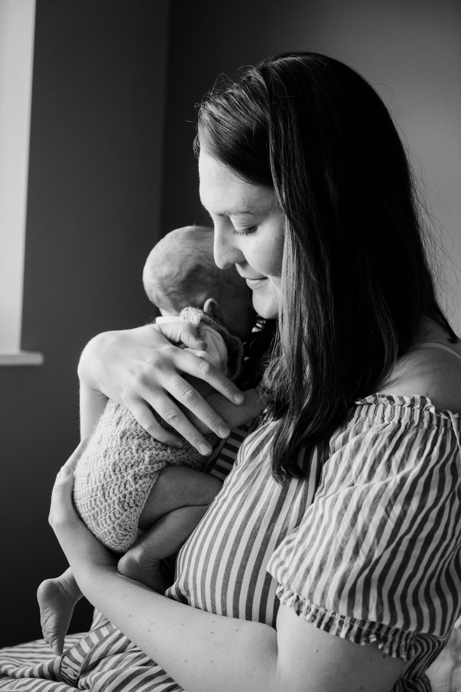 Newborn baby, at home, natural light photograph.