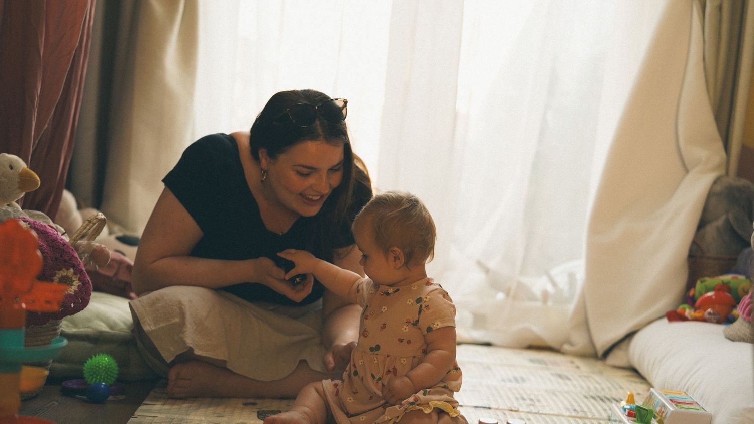 Natural light, at home photography session with mother and baby, in Suffolk.