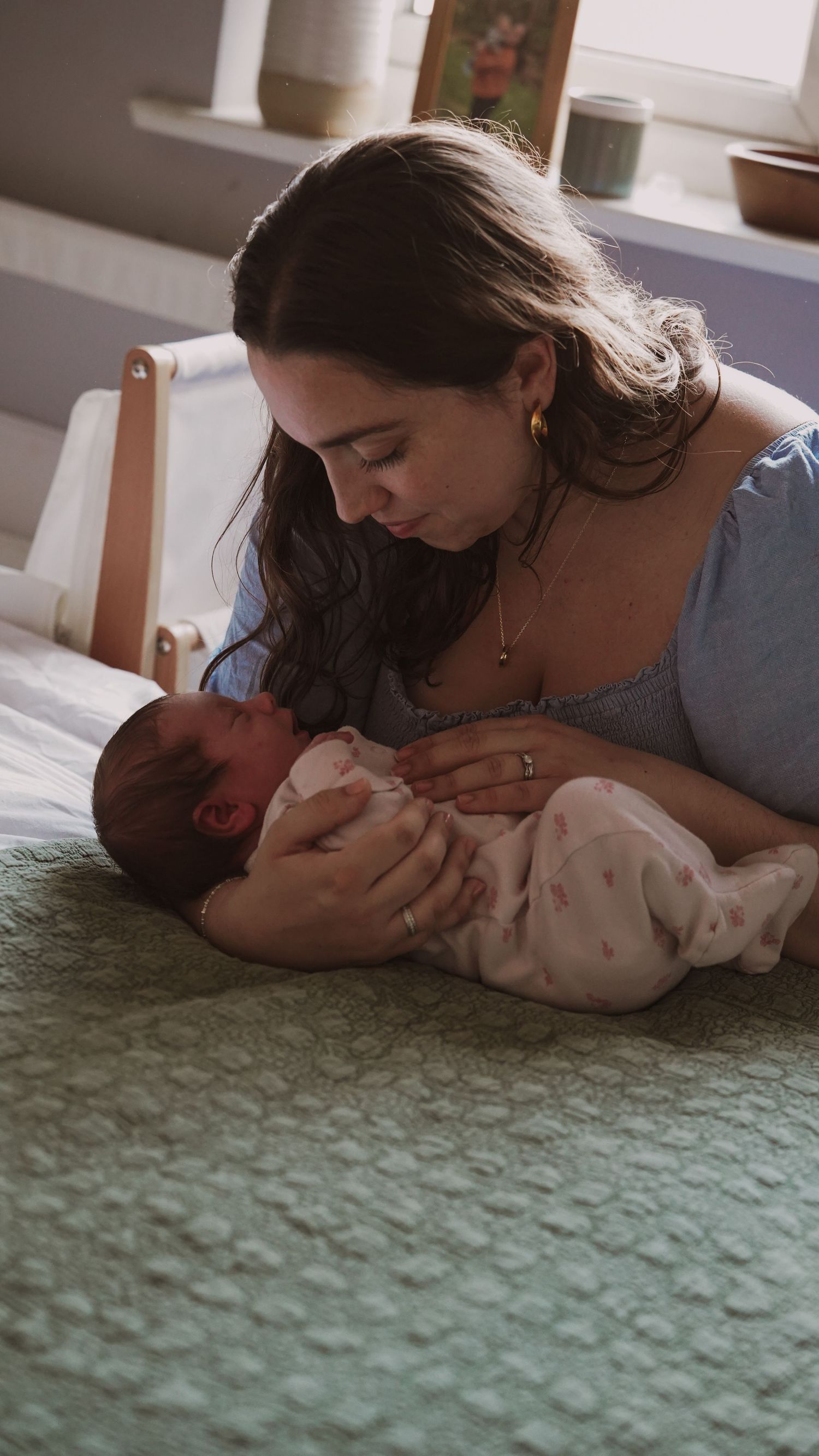 Newborn baby, at home, natural light photograph. Suffolk.