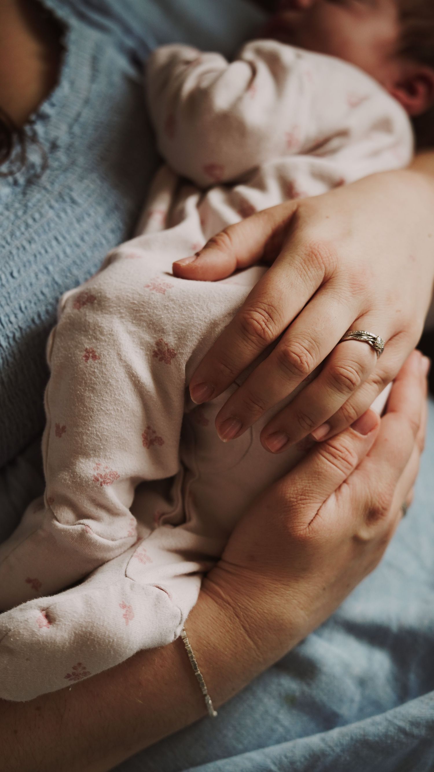 Newborn baby, at home, natural light photograph. Suffolk.