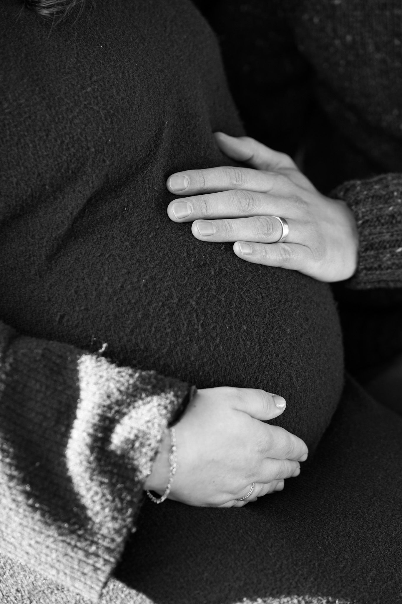Natural light, outdoor family and maternity photos in Suffolk. Pregnant mother's bump and partner.