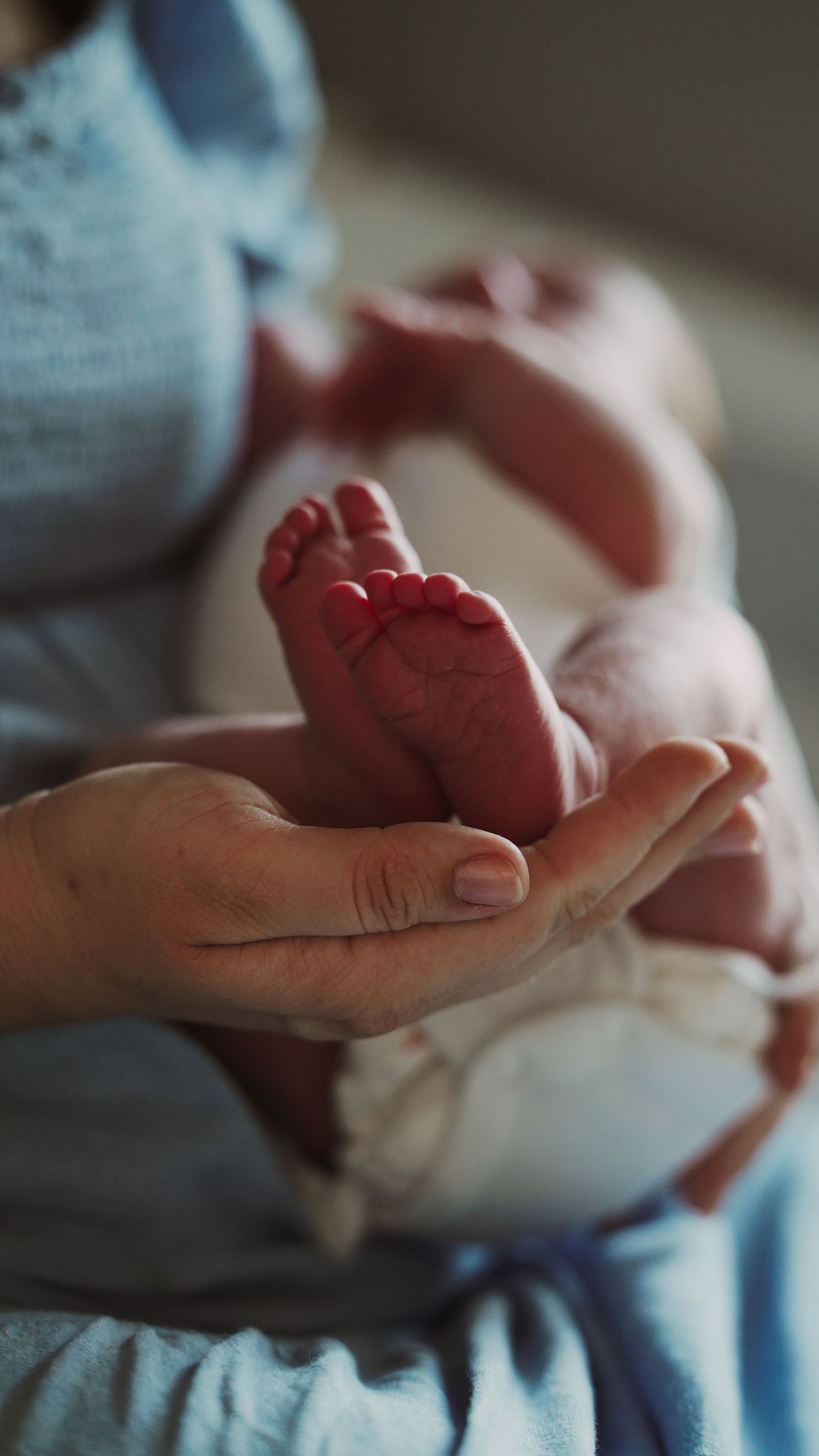 Newborn baby, at home, natural light photograph. Suffolk.