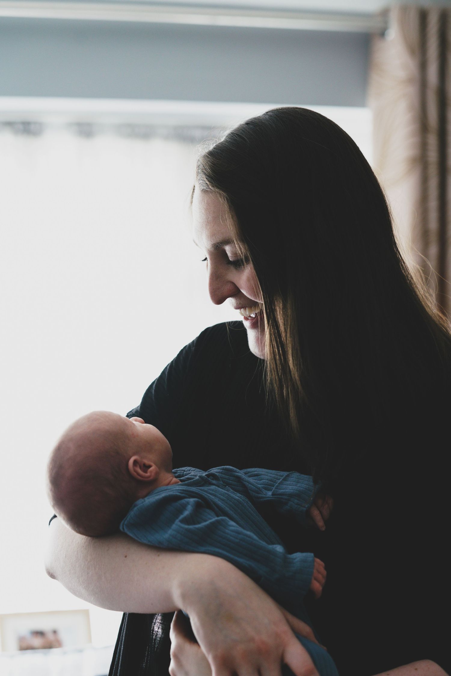 Newborn baby, at home, natural light photograph.