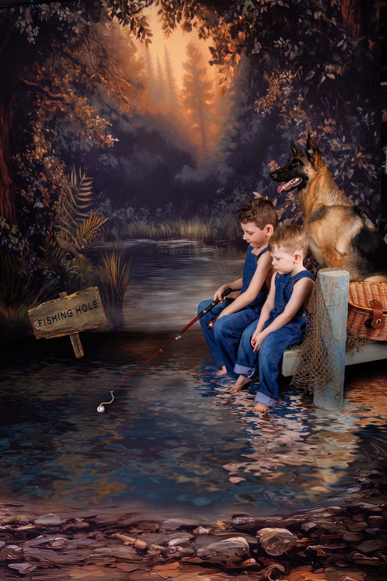 Two children sitting at a fishing hole with a German Shepherd dog in a fantasy forest photo.