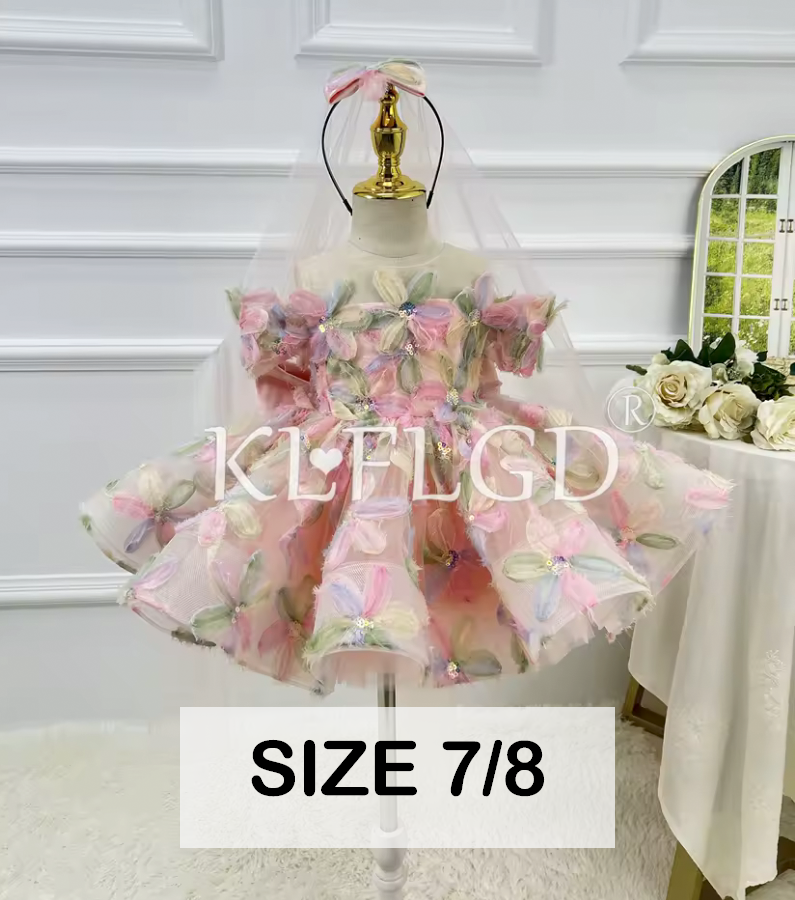Girl's size 7/8 floral tulle dress with pink flowers and layered skirt on mannequin.