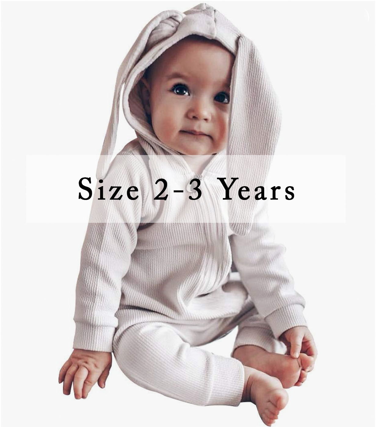 Adorable baby in a cream ribbed hooded bunny ear romper, size 2-3 years.