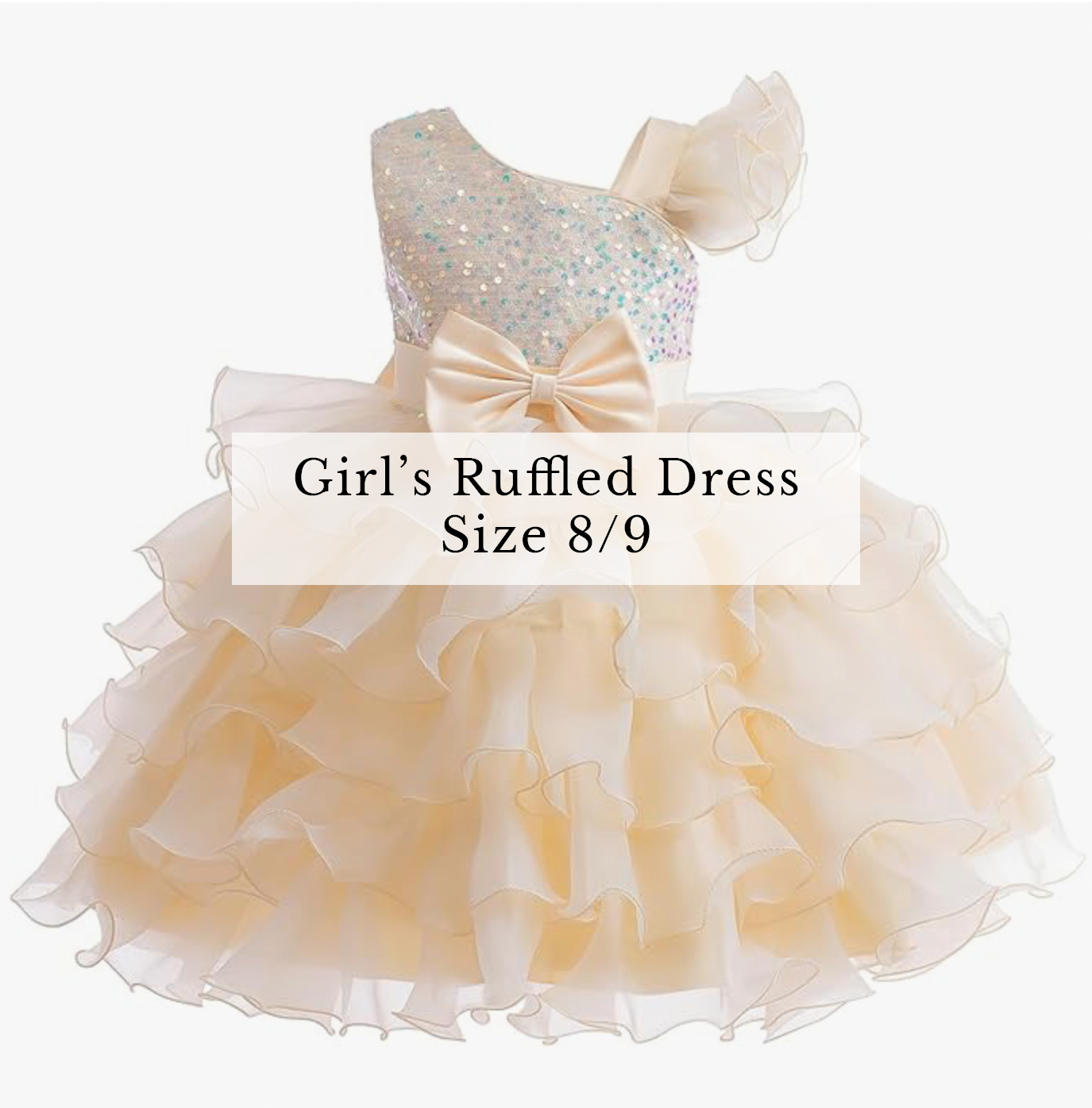 Girls sequin ruffled dress size 8/9 in champagne with bow detail.