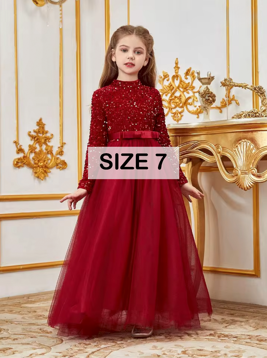 Girl's size 7 burgundy sequin bodice long sleeve tulle ball gown dress with satin bow waist.
