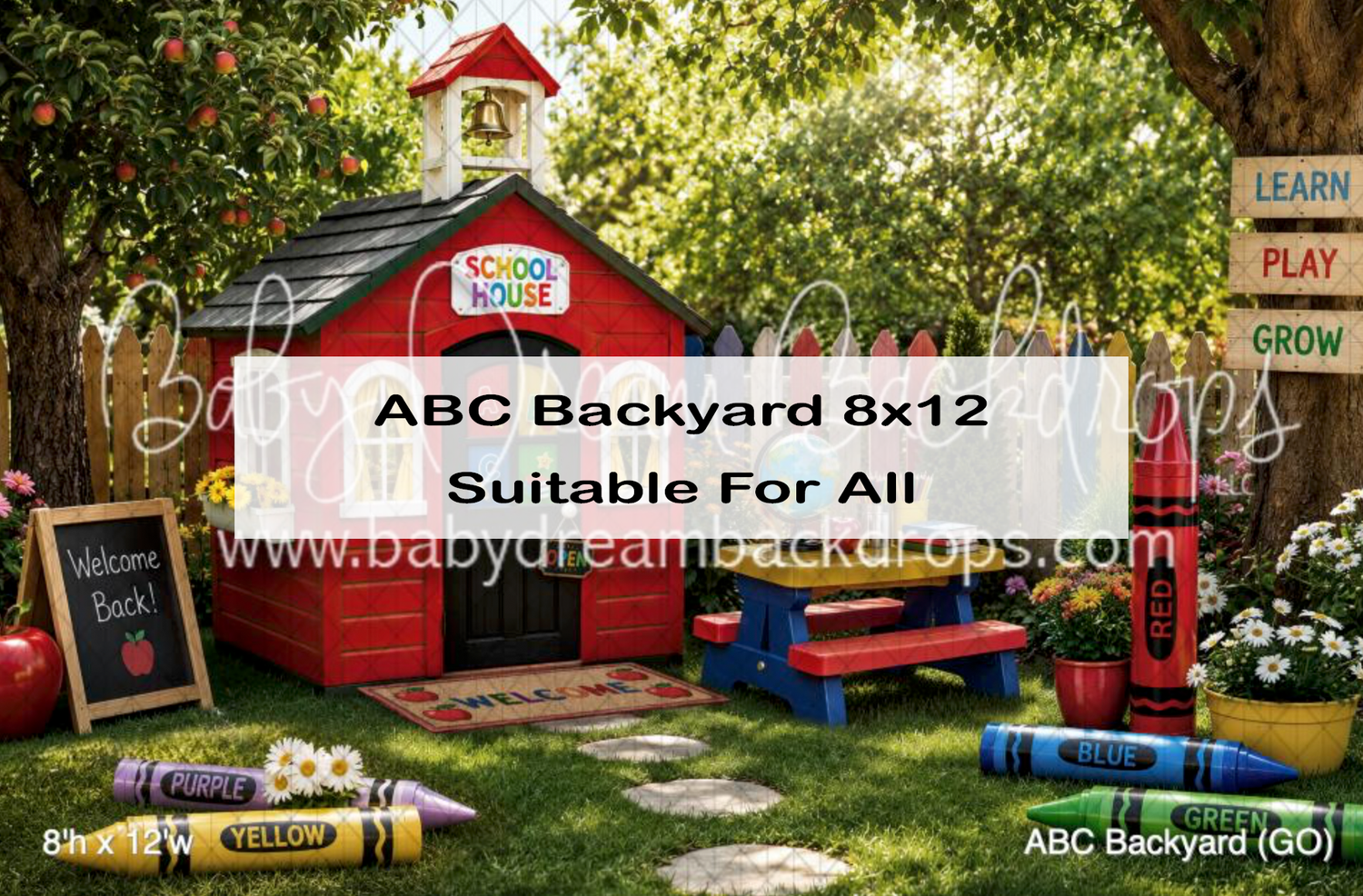 Red schoolhouse photography backdrop with colorful crayons, chalkboard, and lush garden setting for back-to-school photos.